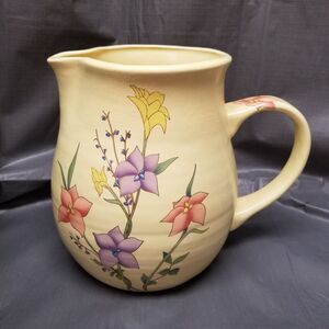 pottery stoneware yellow pitcher 8.5" tall x 10.5" wide floral iris pattern